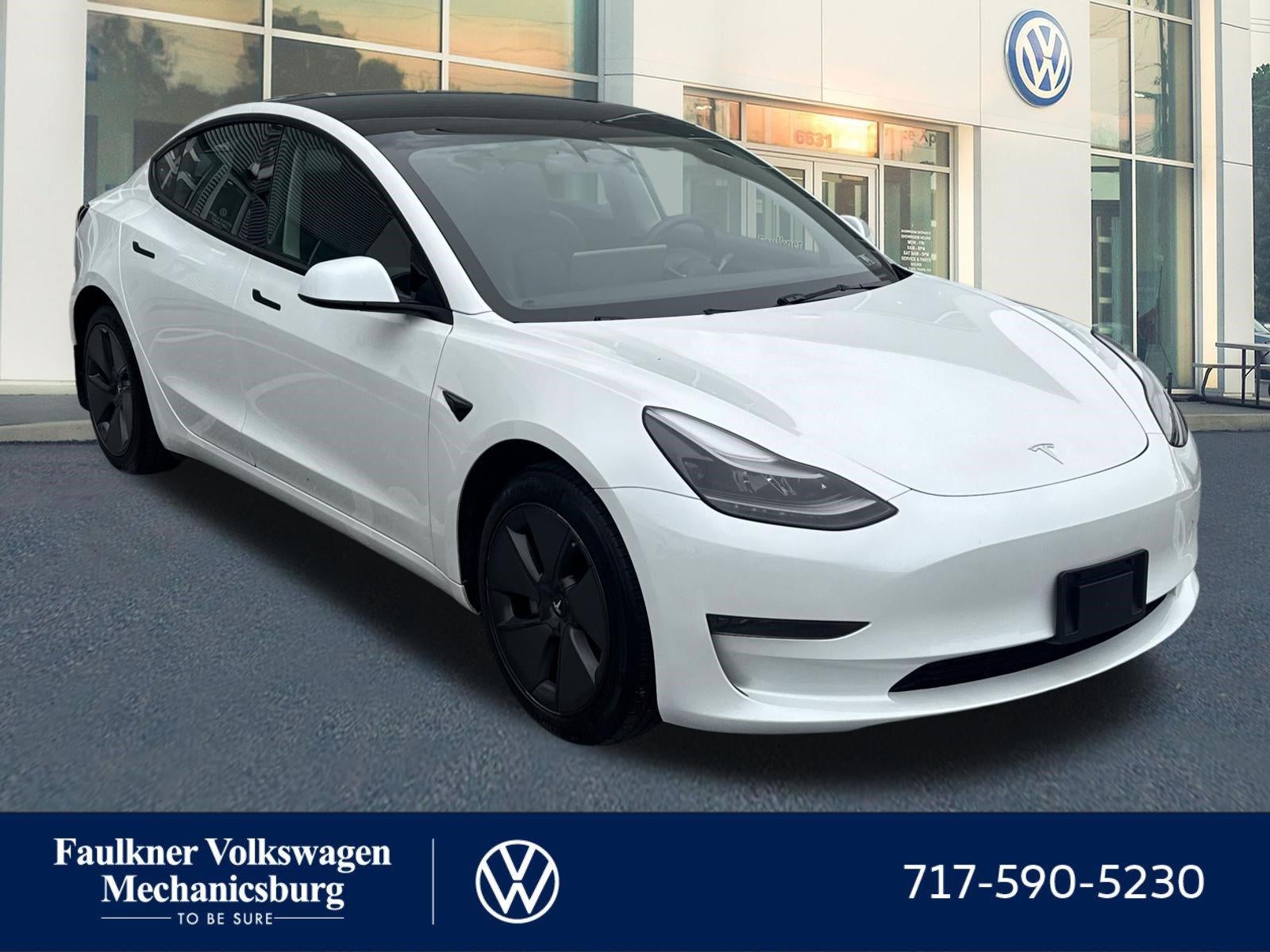 2023 Tesla Model 3 RWD in Pearl White Multi Coat — front three-quarter view